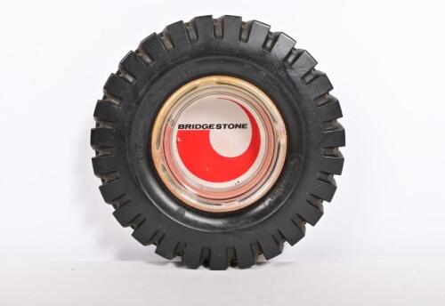 BRIDGESTONE: A circa 1960's Bridgestone tractor tyre form ashtray, 16.5cm diameter