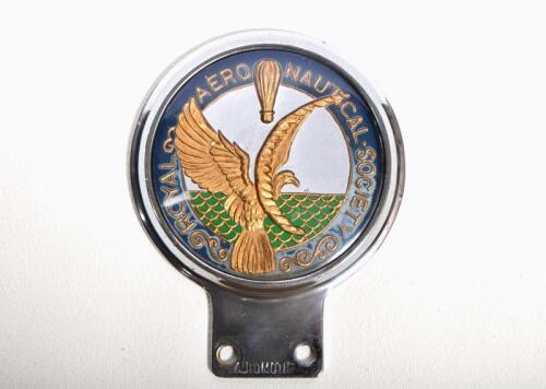 ROYAL AERONAUTICAL SOCIETY: A circa 1960s Royal Aeronautical Society club badge by Automotif in brass/nickel with plastic insert 11.5cm high x 9.5cm diameter