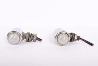 INDICATOR: A pair of circa 1930/40s chrome on brass indicator lamps, 8.5cm long, glass 2.5cm
