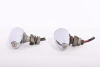 INDICATOR: A pair of circa 1930/40s chrome on brass indicator lamps, 8.5cm long, glass 2.5cm - 3