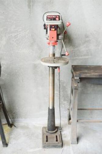 DRILL: A Peerless 3/4 HP 16-speeds electric drill press, model 1516F