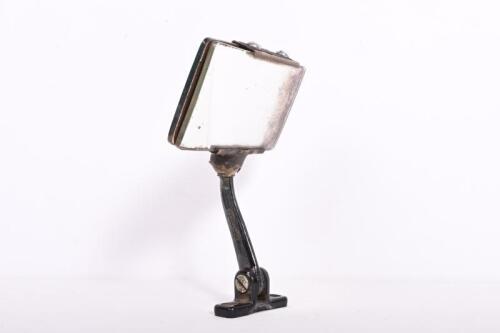 REAR VIEW MIRROR: A 1920/30s day and night rotating mirror, 13.5cm long