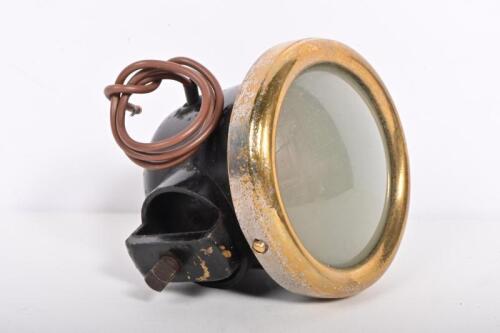 LUCAS: A circa 1920s brass reverse light, makers mark to rear, .9cm high, glass 6cm diameter