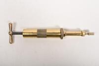 ENOTS: A circa 1920s Enots Autoram brass grease gun,24cm long