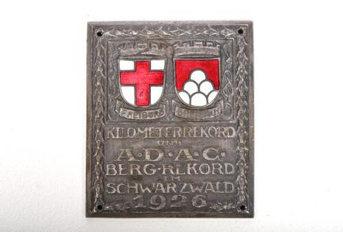 BADGE: A 1926 Austrian ADAC commemorative car rally badge, Freiburg to Breisach, bronze and enamel, signed Max lower centre, 9 x 7.5cm