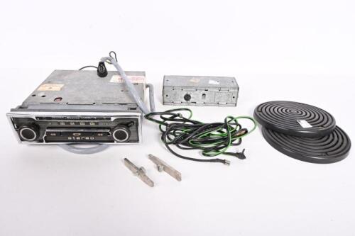 BECKER: A vintage Becker Mexico radio cassette car stereo, in working order and set of speaker covers