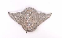 ST CRISTOPHER: A 1920s St. Christopher travellers pin badge, chrome on brass, 7.5cm wide