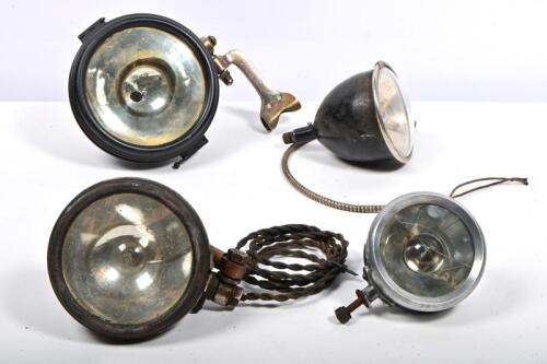 SPOTLIGHTS: A collection of four 1920s spotlights, including S&M lamp company, Autoreelite and Agree B, largest glass 14.5cm diameter