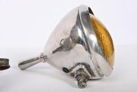 LAMP: An interesting S.H Thomson Mfg Co. USA pistol grip light in military livery and ruby lense, 21cm high, glass 10.5cm diameter, a work spotlight and another - 3