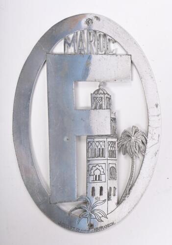 INTERNATIONAL PLATE: A international letter plate from France occupied Marocco in oval frame by J Guinet, Marrakech, nickel on brass, 13x 19cm