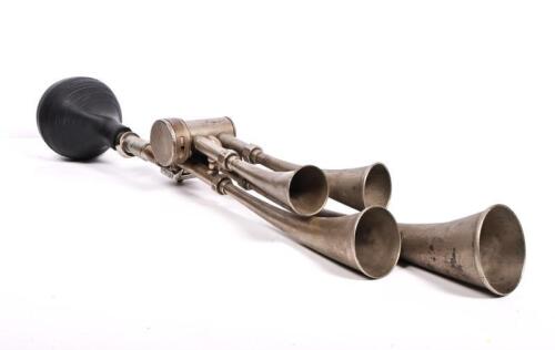 CICCA: A Cicca Le Testaphone nickle plated brass four trumpet car horn, with information sheet, 69cm long