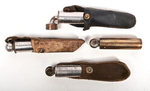 SCHRADER: A collection of four Schrader tyre pressure gauges, some with leather cases, longest 8cm