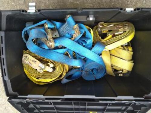 RATCHET STRAPS: A plastic tub containing ratchet straps