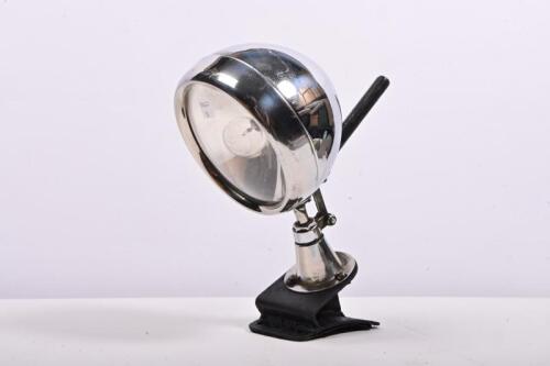LAMP: A spot lamp with hydraulic adjustment, fitted to a spare wheel mounting bracket, unbranded, 36cm high, glass 13.5cm diameter