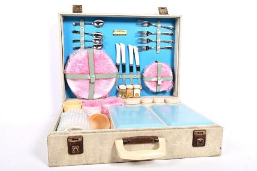 SIRRAM: An original 1950s Sirram motorists picnic case for four with porcelain plates and cups, with keys, lacking a Thermos, the case 35cm high, 48cm wide, 15 cm deep