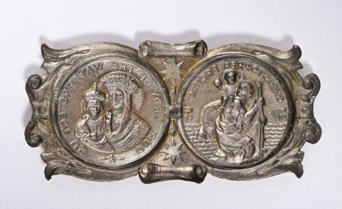 SAINT CHRISTOPHER: A pressed brass St. Christopher plaque, 4 x 8cm