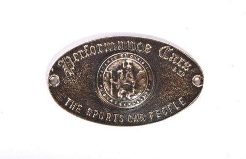 A Performance Cars brass St. Christopher plaque, 5cm wide