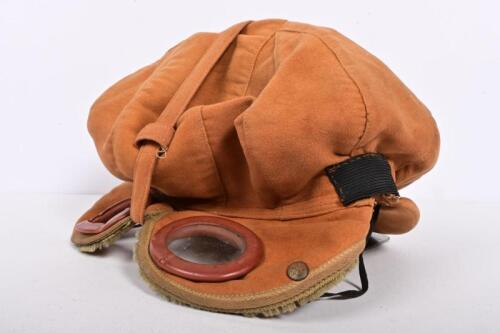MOTORING CAP: A rare early double sided Edwardian driving cap by Gauntic, London, with peak to one side and incorporated googles to the other