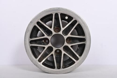 COSMIC WHEELS: A 1970's Cosmic Mini Copper wheel, 29cm diameter