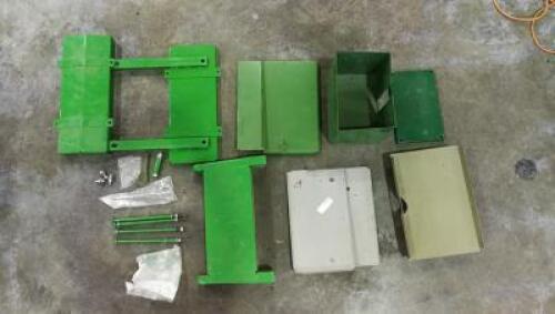 BATTERY: A group of John Deere battery boxes and associated parts