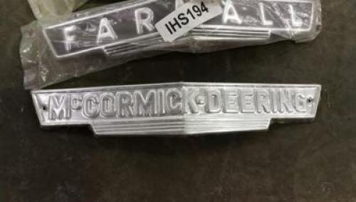 BADGES: Six pressed metal radiator badges for McCormick (anodised), McCormick-Deering and Farmall