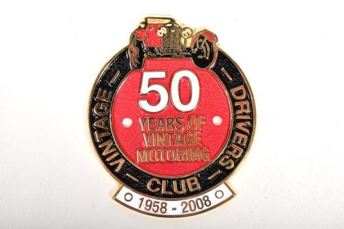 CAR BADGE: A 2008 Vintage Drivers Club commemorative 50 Years of Motoring car badge, enamelled brass, 7.5cm diameter