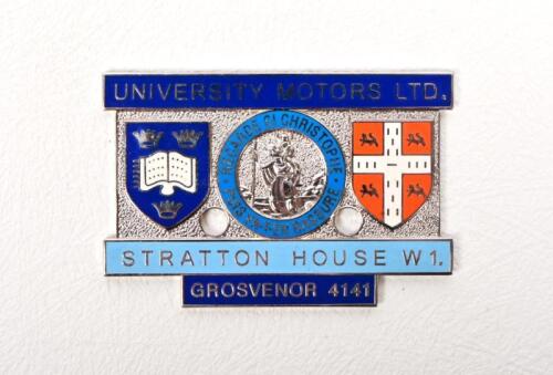 ST. CHRISTOPHER: A University Motors enamelled St. Christopher badge, white metal, 5cm wide