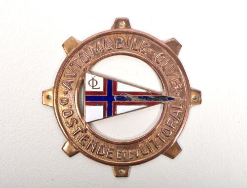 D'OSTENDE: A Ostende et du Littorar Automobile Club enamel and brass badge, some chipping to enamel, 7cm diameter