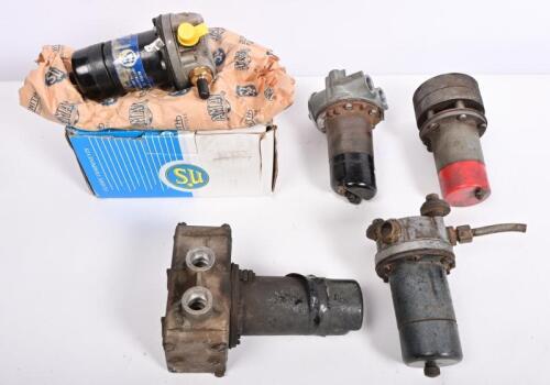 FUEL PUMPS: Five SU fuel pumps, largest 17cm high
