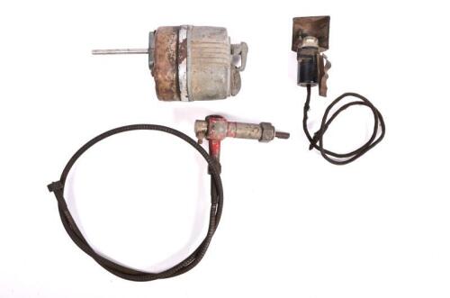 SPARE PARTS: A Lucas 12 volt windscreen wiper motor, a lamp and a speedo/tacho cable
