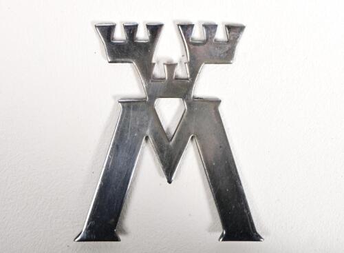 SWEDEN: A Swedish motoring chrome on brass badge featuring three crowns above an M, 8 x 6.5