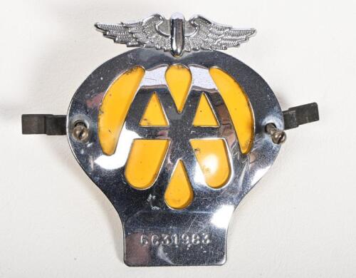 AUTOMOTIVE ASSOCIATION: A circa 1970s Automobile Association AA, chrome on brass with yellow painted pressed metal back, membership no 6C31983, 10.5cm high