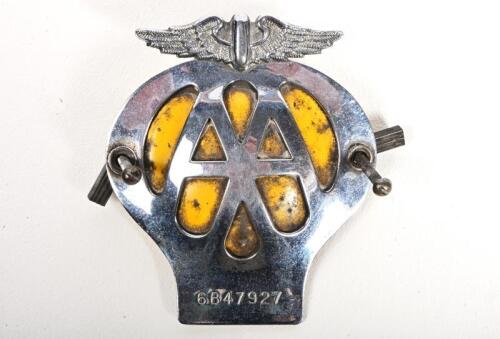 AUTOMOTIVE ASSOCIATION: A circa 1970s Automobile Association AA, chrome on brass with yellow painted pressed metal back, membership no 6B47927, 10.5cm high