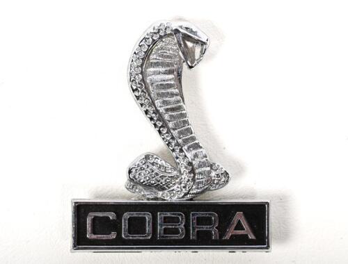 MUSTANG: A Mustang Shelby Cobra badge, circa late 1960s