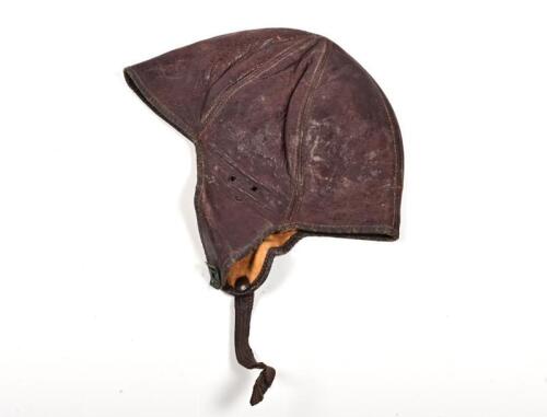 LEATHER CAP: A circa 1930s/1940s small lined leather driving/flying cap, lab reading "M'rr'd Under Cap Code F190143"