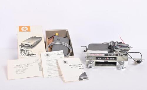 CAR RADIO: A Lear Jet 8 track car radio and a Kelsey automatic electric brake controller