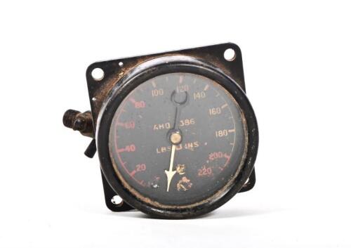 AIRCRAFT PRESSURE GAUGE: A 1940'S aircrafy pressure gauge, black face with 'AHO 3386' stamped to face, converts pound to inches