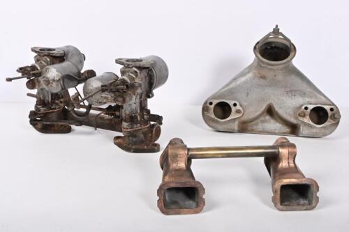 S.U CARBURETTORS: A set of Riley 2.5 litre 1.25 inch S.U carburettors with inlet manifold, together with two manifolds, one a rare 'bronze' MG type inlet manifold, other an Alvis alloy fish tail manifold to suit vintage car