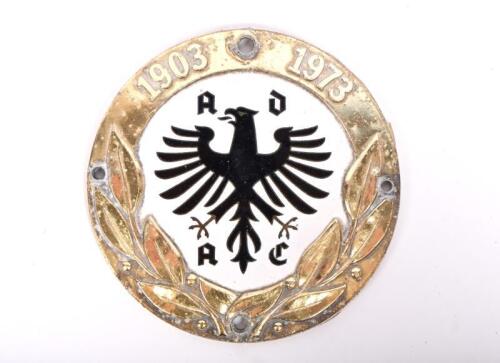 BADGE: A 1973 Austrian ADAC 70 years commemorative car rally badge, enamelled central emblem, brass, 9.5cm diameter