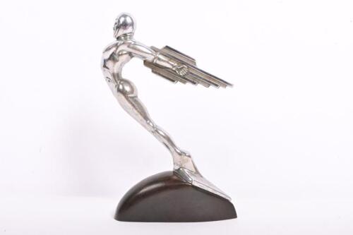 MASCOT: A 1920s 'Rocket Man' American mascot believed to be off a circa 1927 LaSalle, on exotic&nbsp;timber base, 16cm high including base