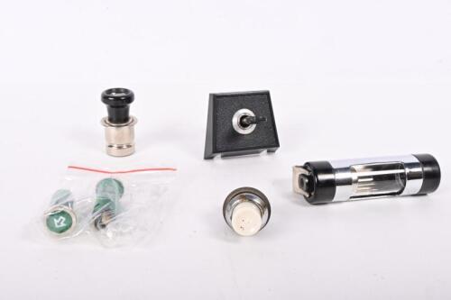 ASSORTED ELECTRICAL: Four NOS items including one toggle switch, one push button switch, one cigarette lighter, one dash light, and two indicator lamps