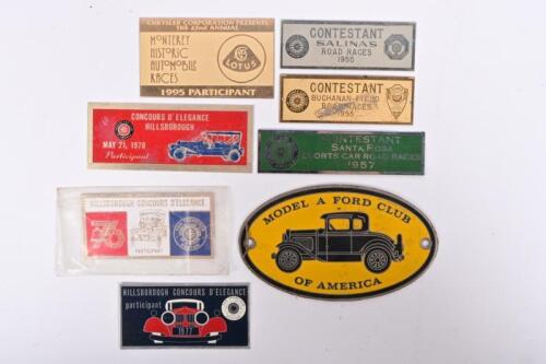 CONTESTANT/PARTICIPANT PLAQUES: A collection of contestant/participant plaques for various events. 'BUCHANAN FIELD ROAD RACES 1955',&nbsp;'SALINAS ROAD RACES 1955', 'SANTA ROSA SPORTS CAR ROAD RACES 1957', 'HILLSBOROUGH CONCOURS D'ELEGANCE, 1976' plaques