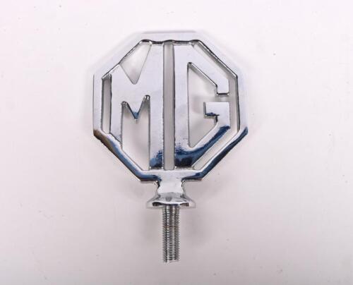 MG: An MG chromed metal octagonal form mascot, 8cm high not including thread