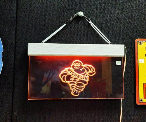 MICHELIN: An illuminated Perspex Michelin sign featuring Bibendum, with European plug, untested, 22 x 39cm