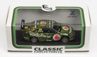HOLDEN: A NOS 1:64 scale Classic Carlectables Holden VE Commodore 2011 Team Vodaphone Jamie Whincup #88 Camouflage Livery die-cast model