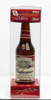 NASCAR: A NOS 1:64 scale Action Collectables Monte Carlo 2002 Dale Earnhardt Jr. "Budweiser - King of Beers" #8 die-cast model contained in Budweiser bottle