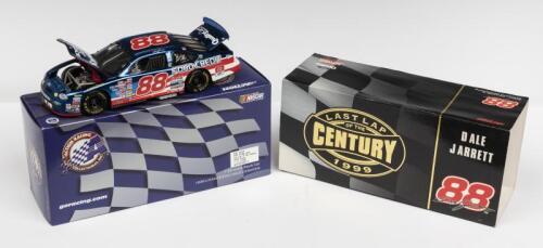 FORD: A NOS 1:24 scale Action Racing Collectables Ford Taurus 1999 Dale Jarrett "Last Lap of the Century" #88 die-cast model