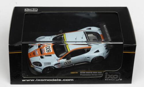 ASTON MARTIN: A NOS 1:43 scale IXO Models Aston Martin DBR9 "Gulf" 2008 #009 Presentation Version die-cast model