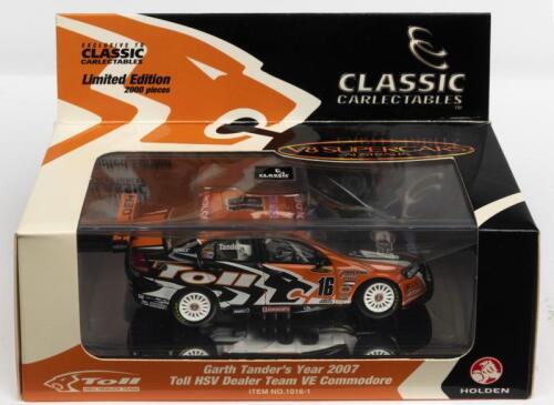 HOLDEN: A NOS 1:43 scale Classic Carlectables Holden VE Commodore #16 Garth Tander 2007 "Toll HSV" with numbered Certificate of Authenticity die-cast model