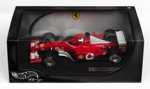 FERRARI: A NOS 1:18 scale Hot Wheels Formula 1 Ferrari F-2002 #2 Rubens Barrichello die-cast model
